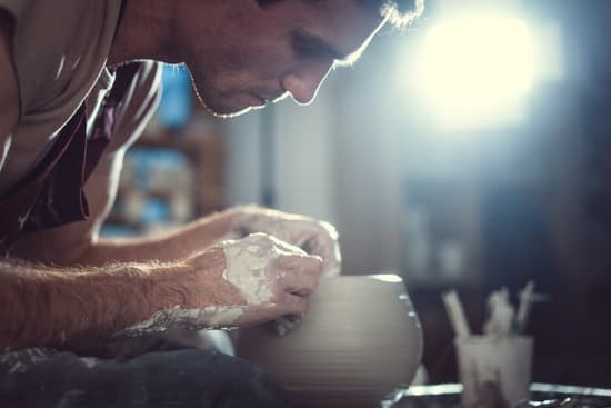 Young pottery worker in studio
