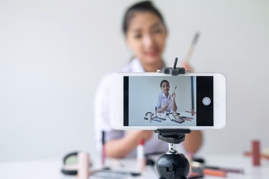Business online on social media, Beautiful Asian woman blogger is showing present tutorial beauty cosmetic product and broadcast live streaming video to social network while recording teaching online.